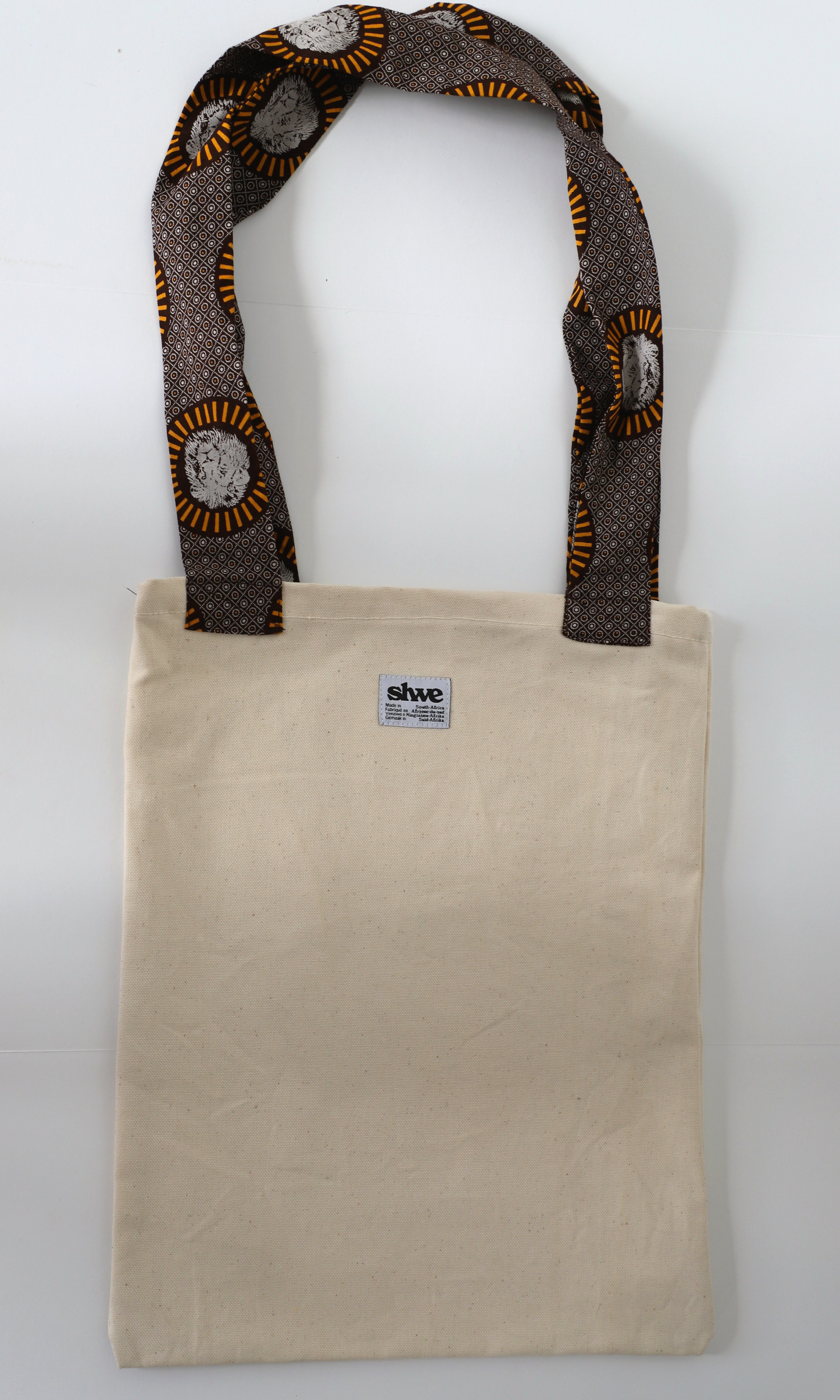 Tote bag avec bretelles en imprimé shweshwe marron avec tête de lion